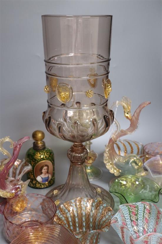 A Bohemian green and gilt glass scent bottle, a large German glass chalice form vase with gilt mask prunts and other glassware,